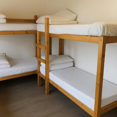Cama o camas de una habitación en Albergue Tritón - Villanúa