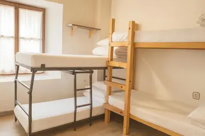 Cama o camas de una habitación en Albergue Tritón - Villanúa