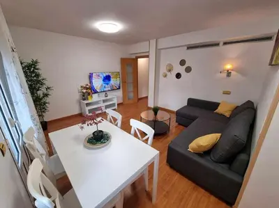 Zona de estar de Las Fuentes del Pilar ComoTuCasa
