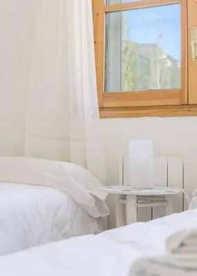 Cama o camas de una habitación en Selva Blanca de Villanua