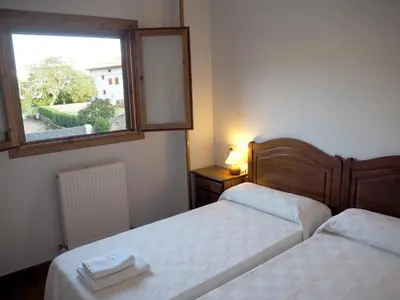 Cama o camas de una habitación en Posada de Ollo