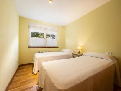 Cama o camas de una habitación en Apartamento en Viella. Valle de Arán