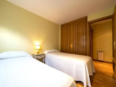Cama o camas de una habitación en Apartamento en Viella. Valle de Arán