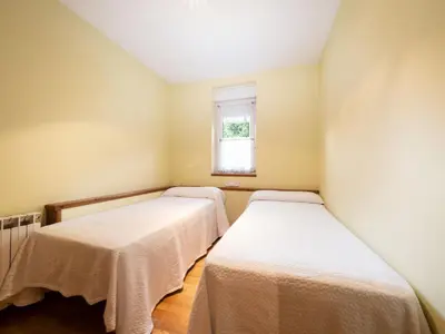 Cama o camas de una habitación en Apartamento en Viella. Valle de Arán