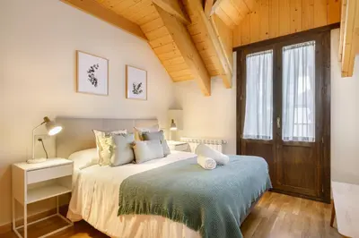 Cama o camas de una habitación en Apartamento A10 de Formigal, AMPLIO Y CON GARAJE