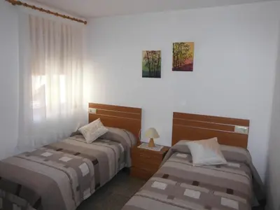 Cama o camas de una habitación en Apartamentos Casa Borja