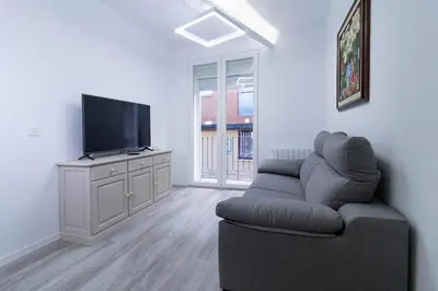 Una televisión o centro de entretenimiento en Piso en el Centro de Zaragoza, Parking GRATIS, Check-in 24h