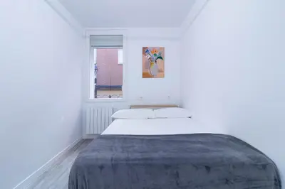 Cama o camas de una habitación en Piso en el Centro de Zaragoza, Parking GRATIS, Check-in 24h