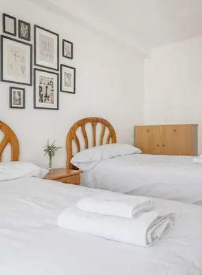 Cama o camas de una habitación en El Mirador de Castiello
