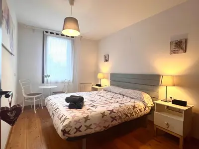 Cama o camas de una habitación en Apartaments del Camp - L'Amfitriona