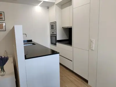 Una cocina o zona de cocina en Apartamentos Ezkaba by Clabao