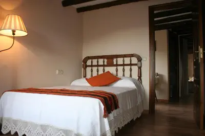 Cama o camas de una habitación en Casa Rural Urbe