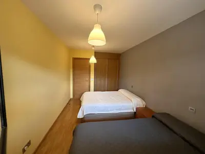 Cama o camas de una habitación en Disfruta del pirineo oscense