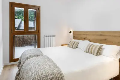 Cama o camas de una habitación en Casa O Berde terraza con vistas a Aramón Panticosa