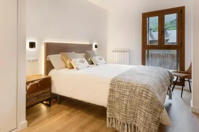 Cama o camas de una habitación en Casa O Berde terraza con vistas a Aramón Panticosa