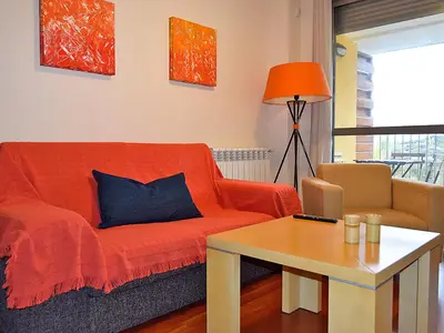 Zona de estar de Apartamentos Las Margas Sabiñánigo 3000