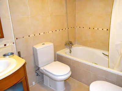 Un baño de Apartamentos Las Margas Sabiñánigo 3000