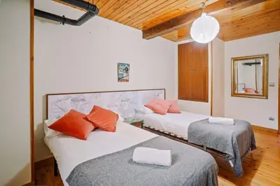 Cama o camas de una habitación en Casa Rural Arix by Cardi Suites