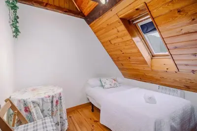 Cama o camas de una habitación en Casa Rural Arix by Cardi Suites