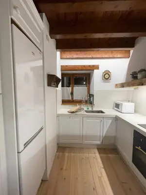 Una cocina o zona de cocina en Apartamento Duplex en Arties