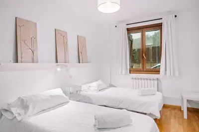 Cama o camas de una habitación en Carlina by Cardi Suites