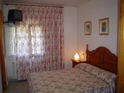 Cama o camas de una habitación en Fonda Muntanya