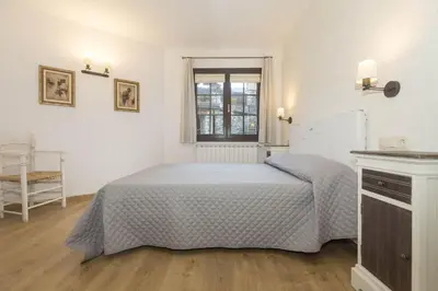 Cama o camas de una habitación en Casa Bringasort