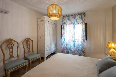 Cama o camas de una habitación en Casa Santiago casa rural