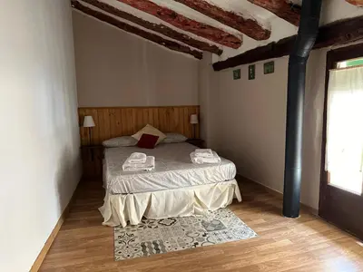Cama o camas de una habitación en Apartaments La Clotxa - Prat de Comte