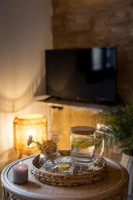 Una televisión o centro de entretenimiento en L’Angorfa de Casa Santiago, casa rural
