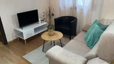 Una televisión o centro de entretenimiento en Apartamento Selva Blanca
