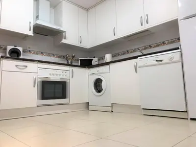 Una cocina o zona de cocina en Apartamentos Ribera Navarra - Bardenas