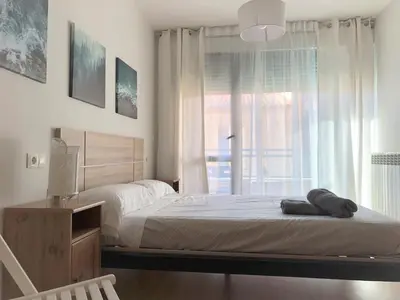 Cama o camas de una habitación en Apartamentos Ribera Navarra - Bardenas