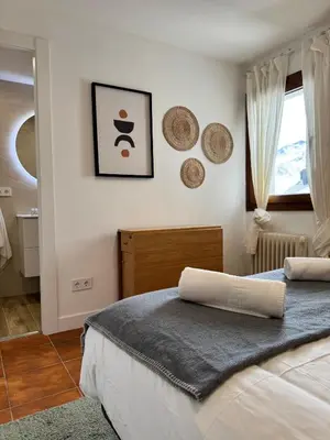 Cama o camas de una habitación en Rincón de Anayet | Entrada Autónoma | Formigal