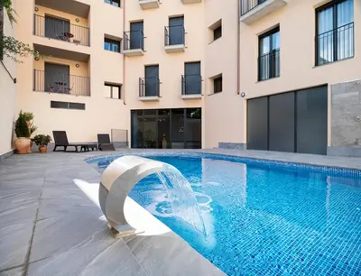 Piscina en o cerca de Apartamentos Torre del Reloj