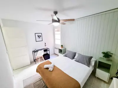 Cama o camas de una habitación en El Tigre del Pilar Turistea