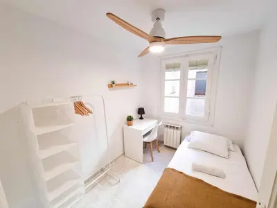 Cama o camas de una habitación en El Tigre del Pilar Turistea