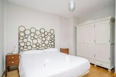 Cama o camas de una habitación en Atenea by CARDI Suites