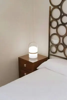Cama o camas de una habitación en Atenea by CARDI Suites