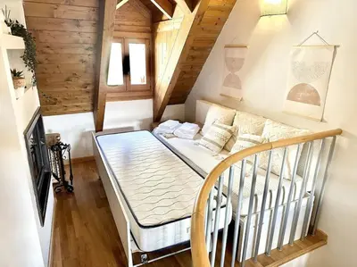 Cama o camas de una habitación en Dúplex en Sallent de Gállego