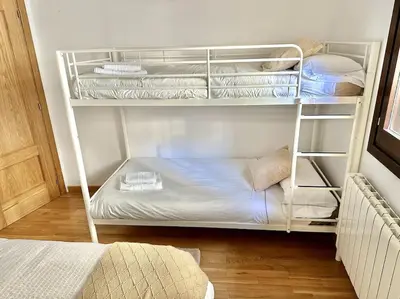 Cama o camas de una habitación en Dúplex en Sallent de Gállego