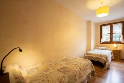 Cama o camas de una habitación en Apartamentos Onki Xin
