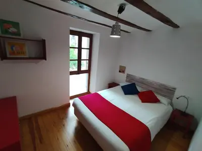 Cama o camas de una habitación en Apartamento centro Benasque