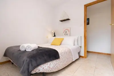 Cama o camas de una habitación en Treparriscos Home l Cine en casa l WIFI l Vistas