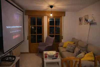 Zona de estar de Treparriscos Home l Cine en casa l WIFI l Vistas