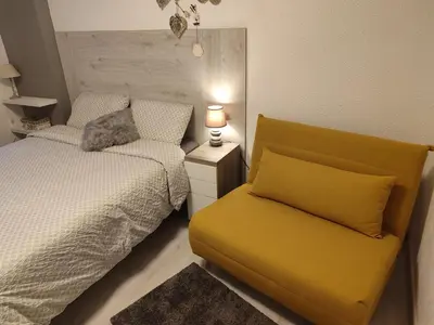 Cama o camas de una habitación en Descanso en el pirineo
