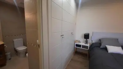Cama o camas de una habitación en Dúplex Terraza Golf 3 Dormitorios 2 Baños