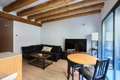 Una televisión o centro de entretenimiento en Apartamento Chapitela Deluxe