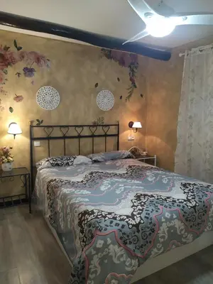 Cama o camas de una habitación en La Palmera de la Insula