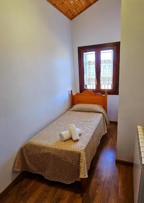 Cama o camas de una habitación en CASA COTIELLA RAÑIN